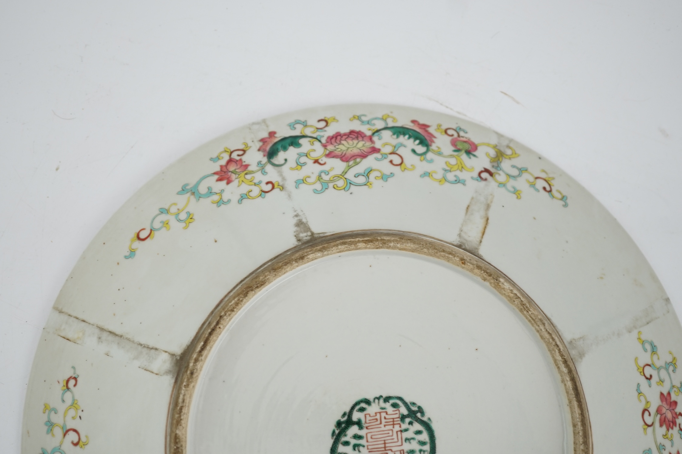 A Chinese yellow ground ‘dragon’ dish, late 19th century, minor damage